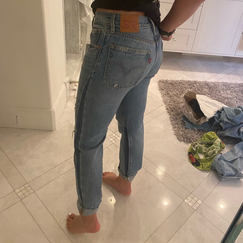 Levi’s jeans with dark stripe down the side
